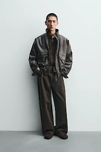 BLOUSON COURT MATIÈRE SYNTHÉTIQUE
