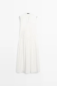 Matching dress with pleated skirt