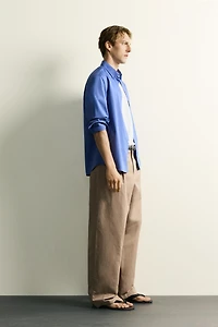RELAXED FIT PLEATED PANTS