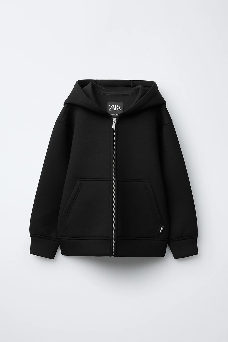 NEOPRENE-LOOK LABEL JACKET