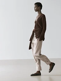 Suit trousers with buckle detail