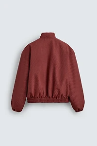 BLOUSON COUPE-VENT REMBOURRÉ À CARREAUX