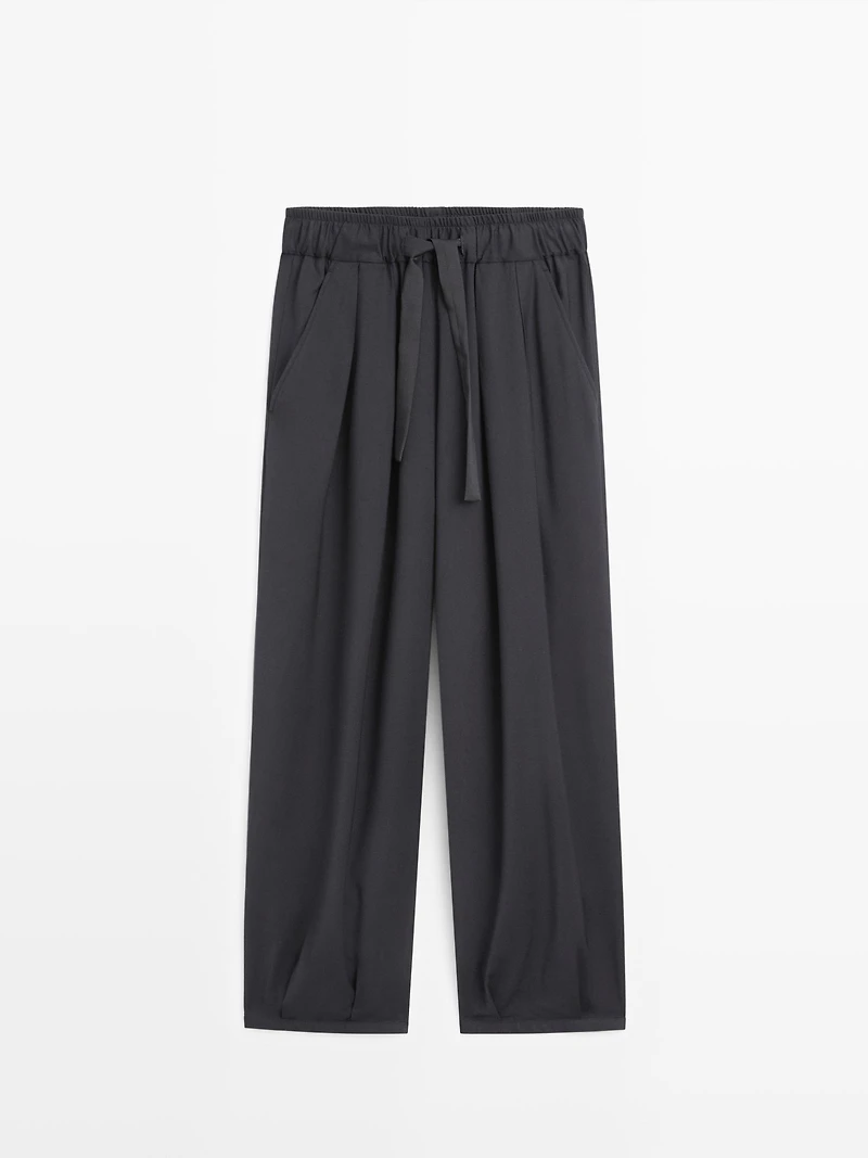 Voluminous wide-leg pleated trousers
