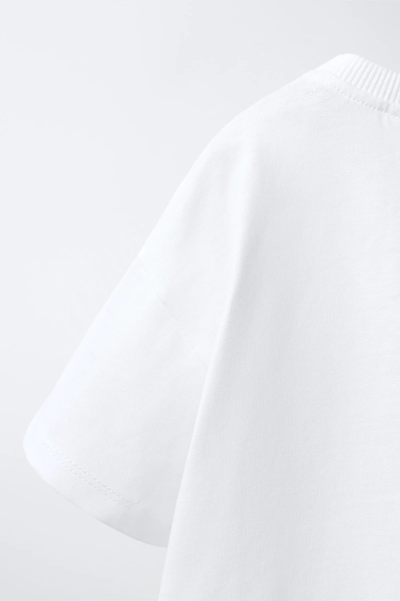 T-SHIRT POCHE FLEUR EN CROCHET