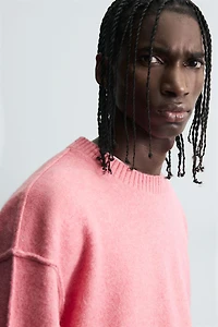 TEXTURED SWEATER WITH REVERSE EFFECT SEAMS