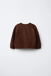 PULL EN MAILLE AVEC CANARD BRODÉ