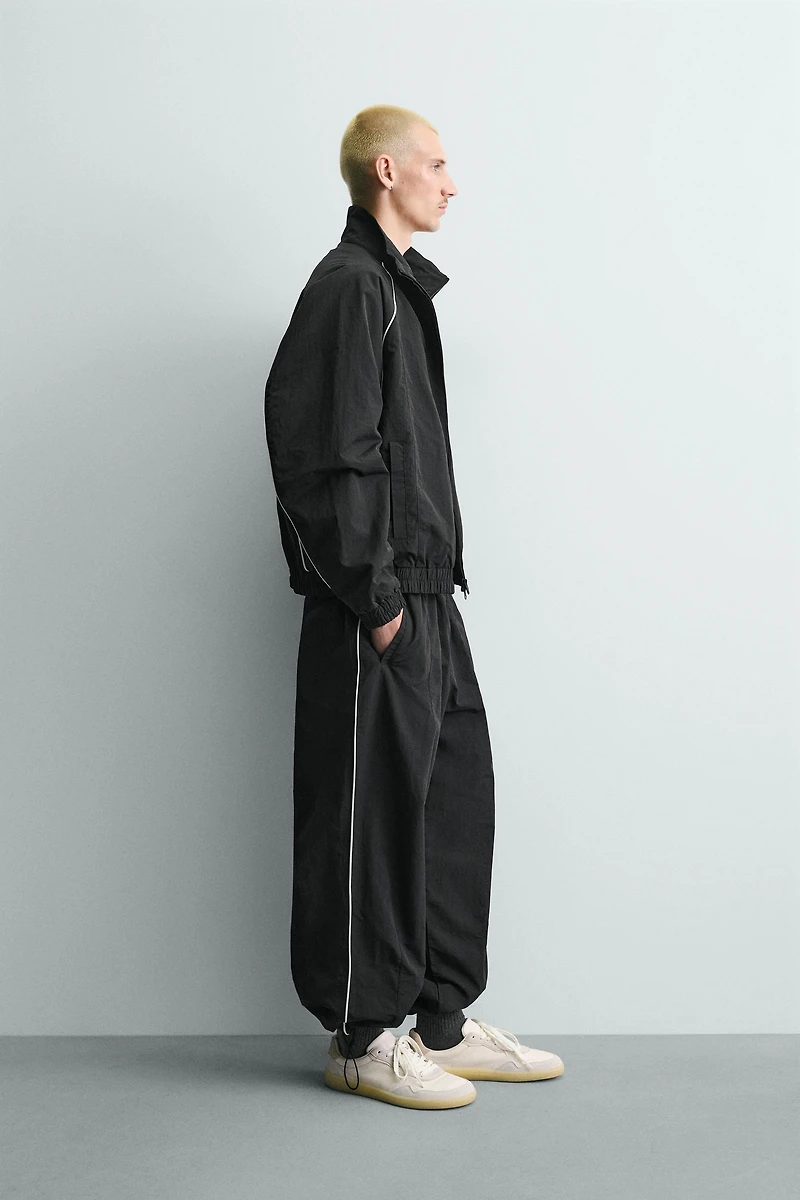 CONTRASTING TECHNICAL JACKET