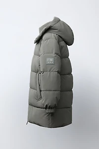 MANTEAU LONG À ÉTIQUETTE GOMMÉE