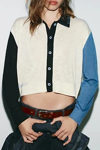 GILET EN MAILLE CONTRASTANT