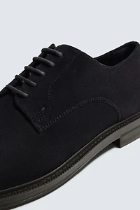 CHAUSSURES EN CUIR