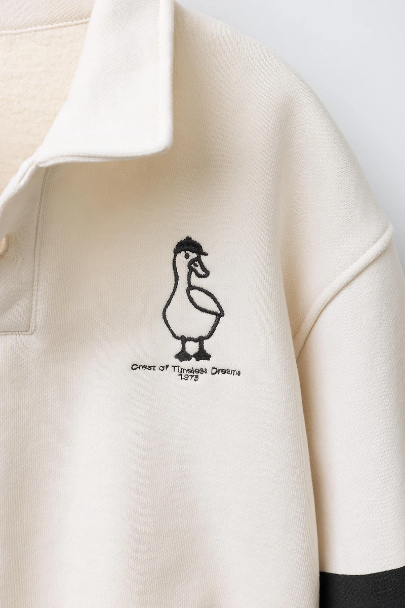 SWEAT POLO CANARD BRODÉ