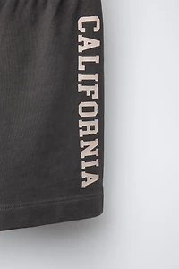 TEXT JOGGING SHORTS