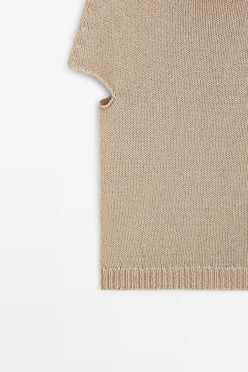 Pull en maille à manches courtes et col roulotté