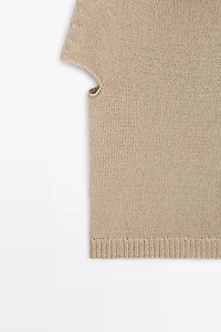 Pull en maille à manches courtes et col roulotté