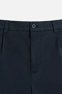 REGULAR FIT PLEATED BERMUDA SHORTS