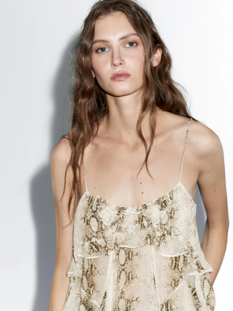 Ruffled snakeskin print top with gathered detail