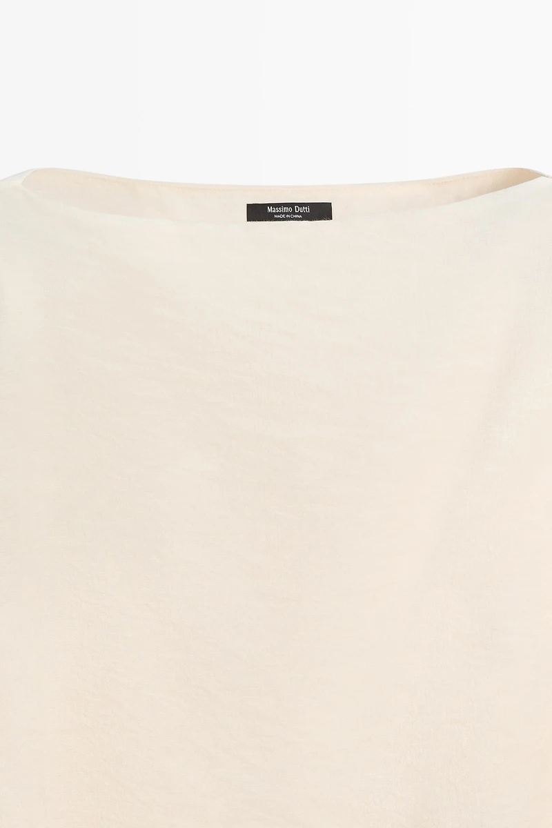 Asymmetric cape-style flowing blouse