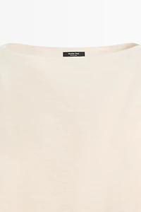 Asymmetric cape-style flowing blouse