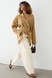 Striped flowing shirt with corset belt detail