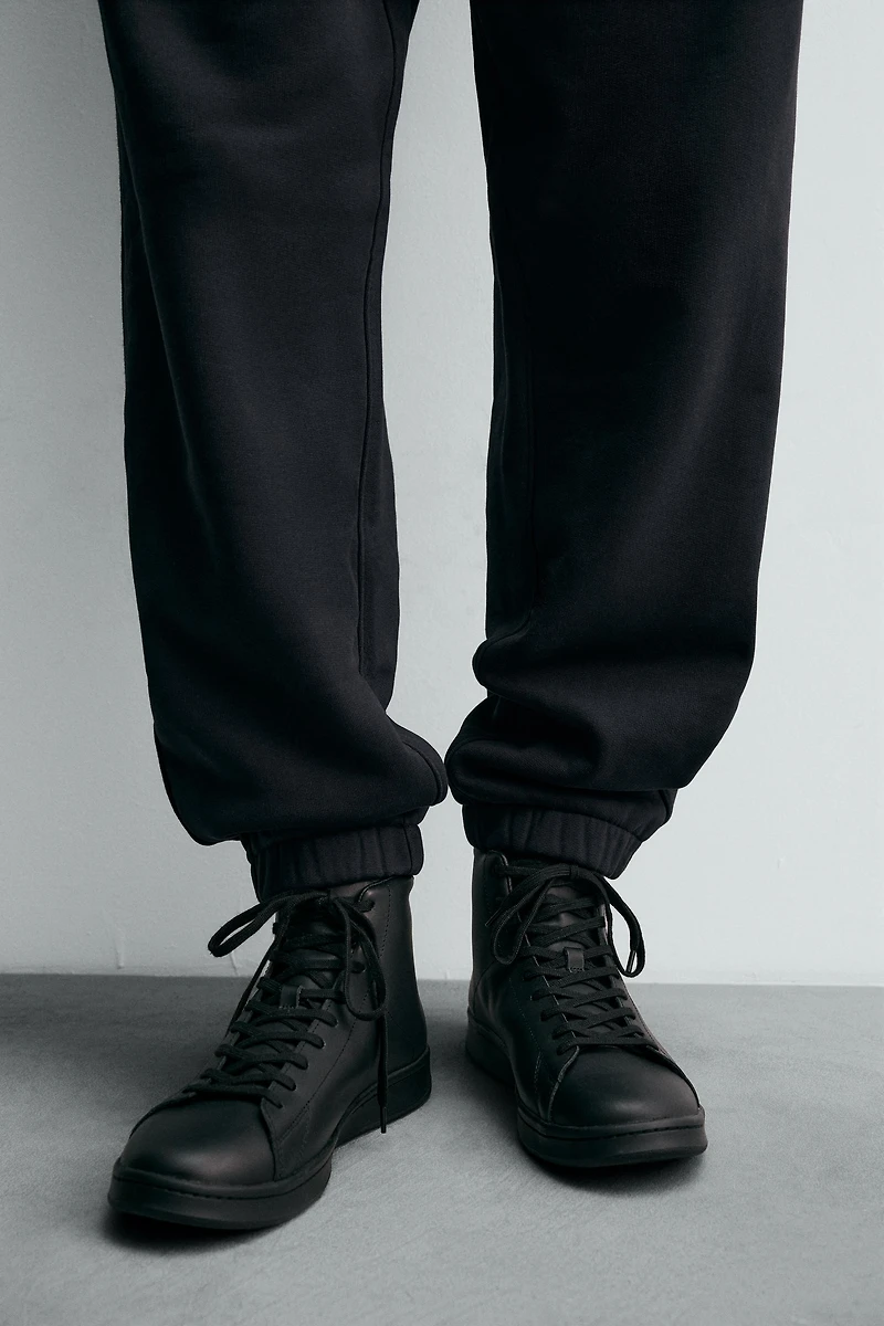 LEATHER HIGH-TOP SNEAKERS