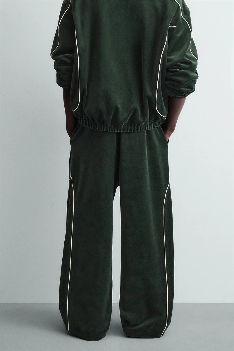 VELOUR PIPED PANTS