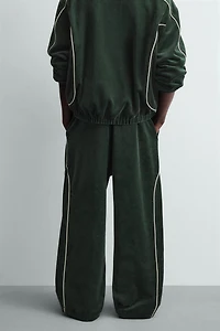 VELOUR PIPED PANTS