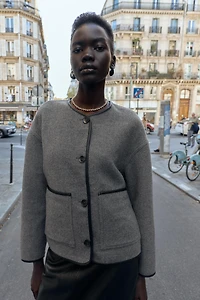 REVERSIBLE FAUX LEATHER PIPING JACKET