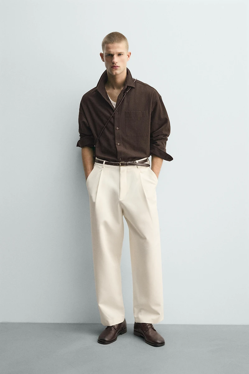 PANTALON RELAXED FIT À PLIS