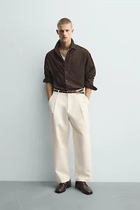 PANTALON RELAXED FIT À PLIS