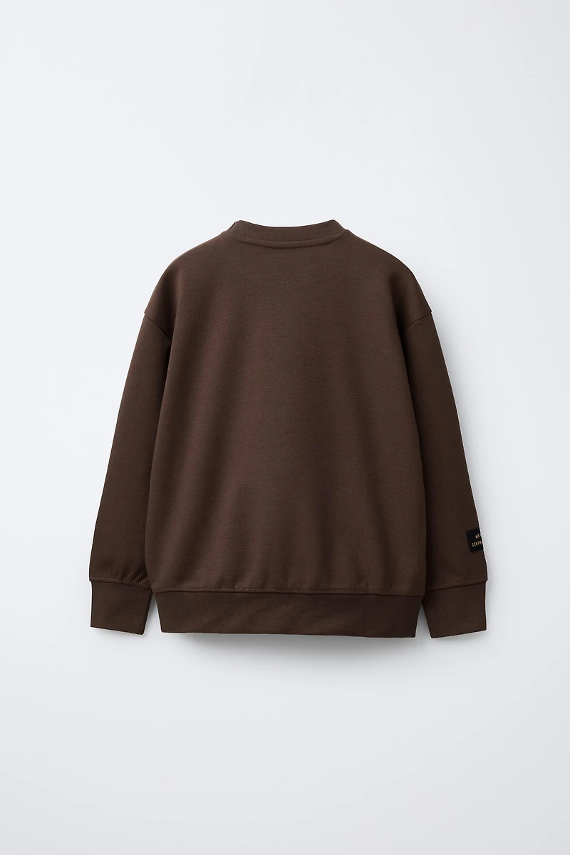 VARSITY INTERLOCK SWEATSHIRT