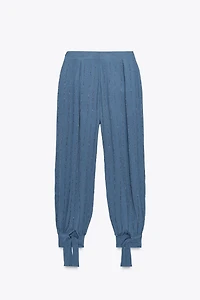 BEADED PANTS WITH TIED HEMS