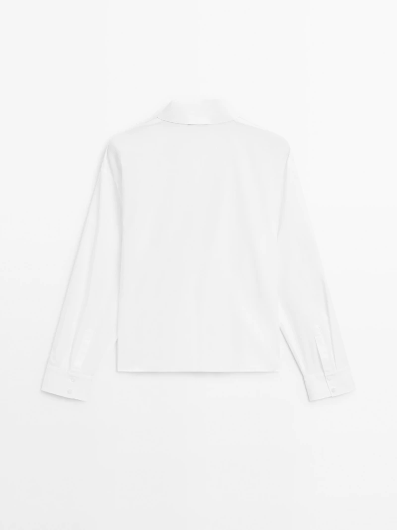 100% cotton shirt with draped asymmetric hem