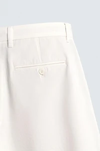 RELAXED FIT PLEATED SHORTS