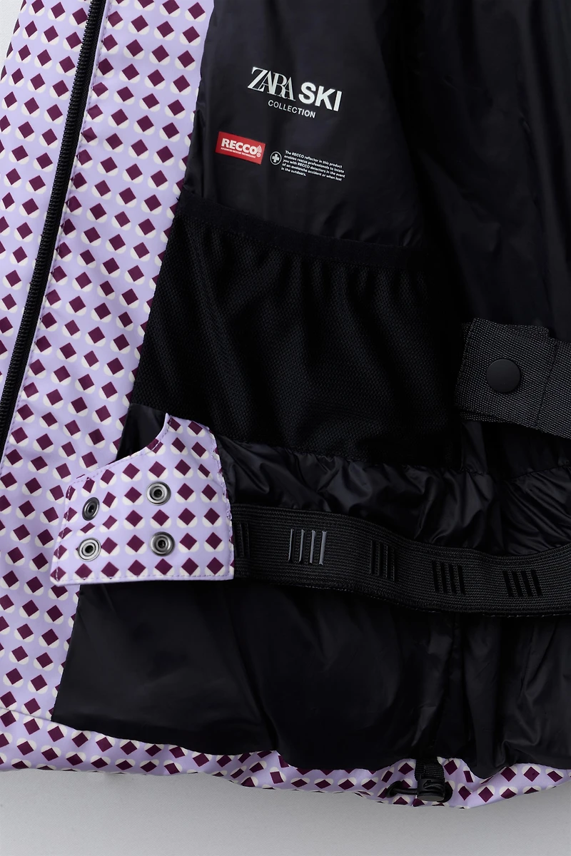 DOUDOUNE 80% DUVET ET 20% PLUMES IMPRIMÉ GÉOMÉTRIQUE WATER RESISTANT COUPE-VENT SYSTÈME RECCO® COLLECTION SKI