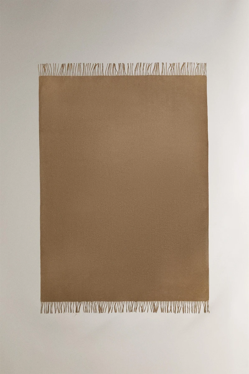 DECORATIVE FRINGED BLANKET