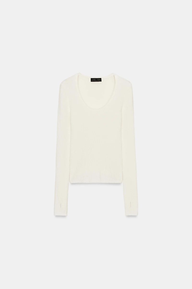 PULL CÔTELÉ AVEC LAINE