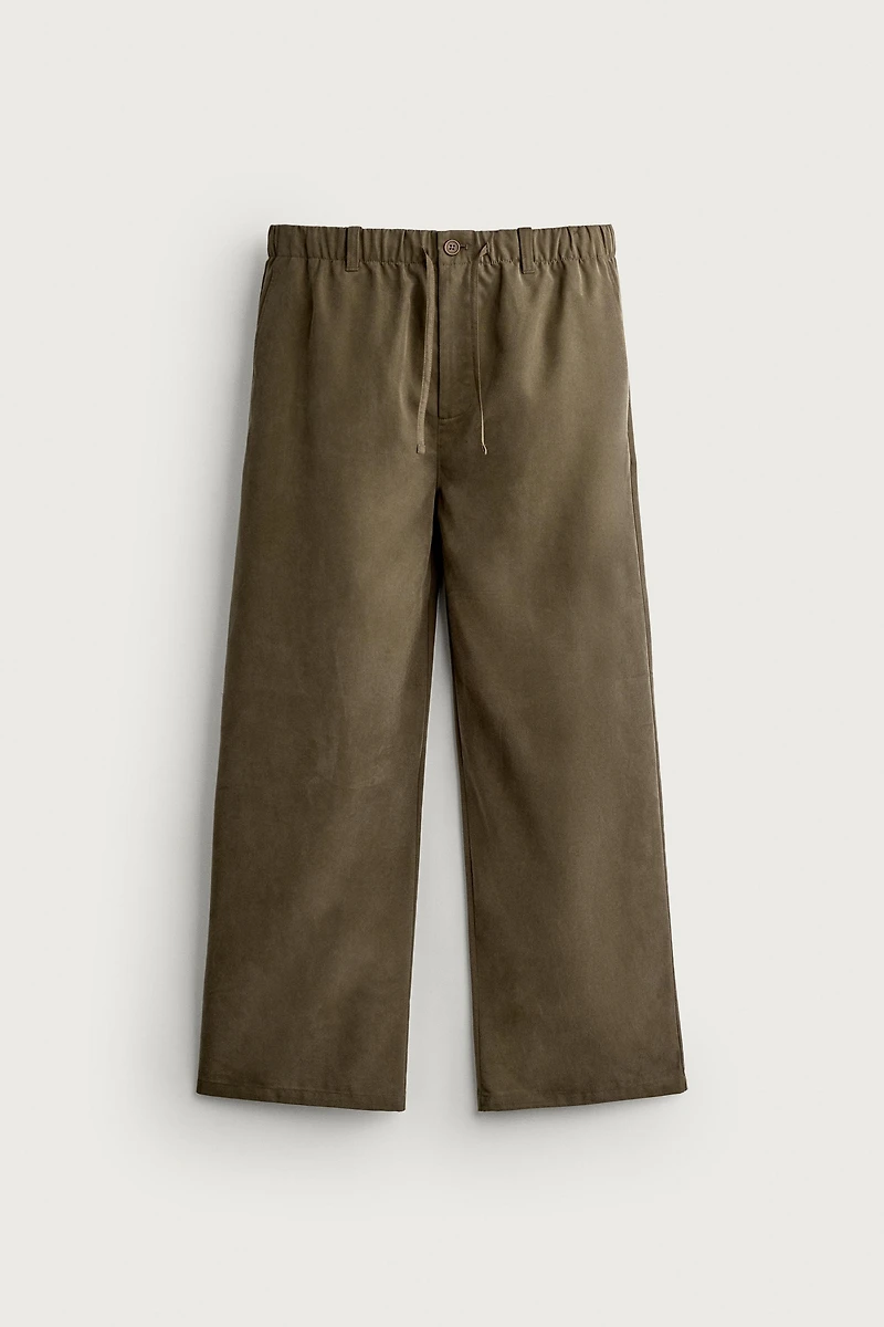 RELAXED FIT FLOWY PANTS