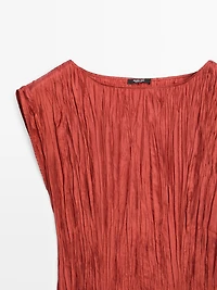 Robe longue plissée satinée