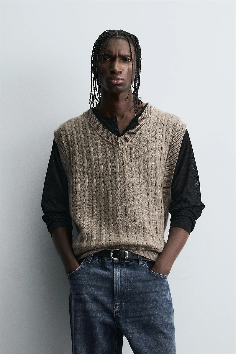 GILET EN TRICOT RÉVERSIBLE EFFET ENVERS