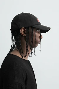 CASQUETTE DÉLAVÉE TEXTE IMPRIMÉ