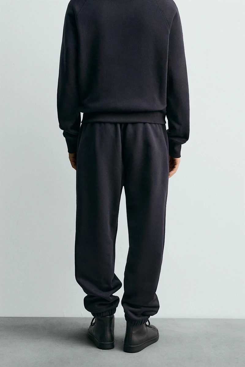 PANTALON DE JOGGING REGULAR FIT PASSEPOILÉ