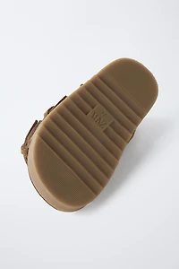 SANDALES À BOUCLES EN CUIR