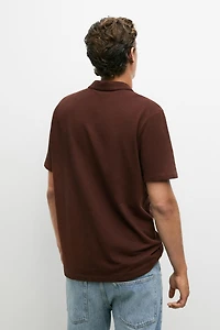 Polo micro-texturé en coton mélangé