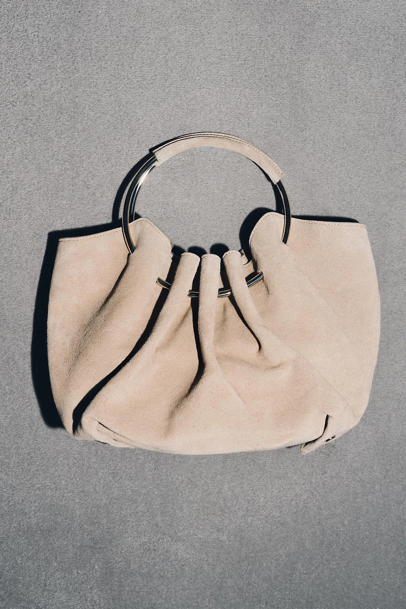 RIGID HANDLE SPLIT LEATHER BUCKET BAG