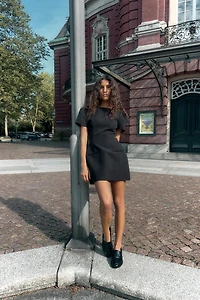 SHORT PLEATED POCKET DRESS