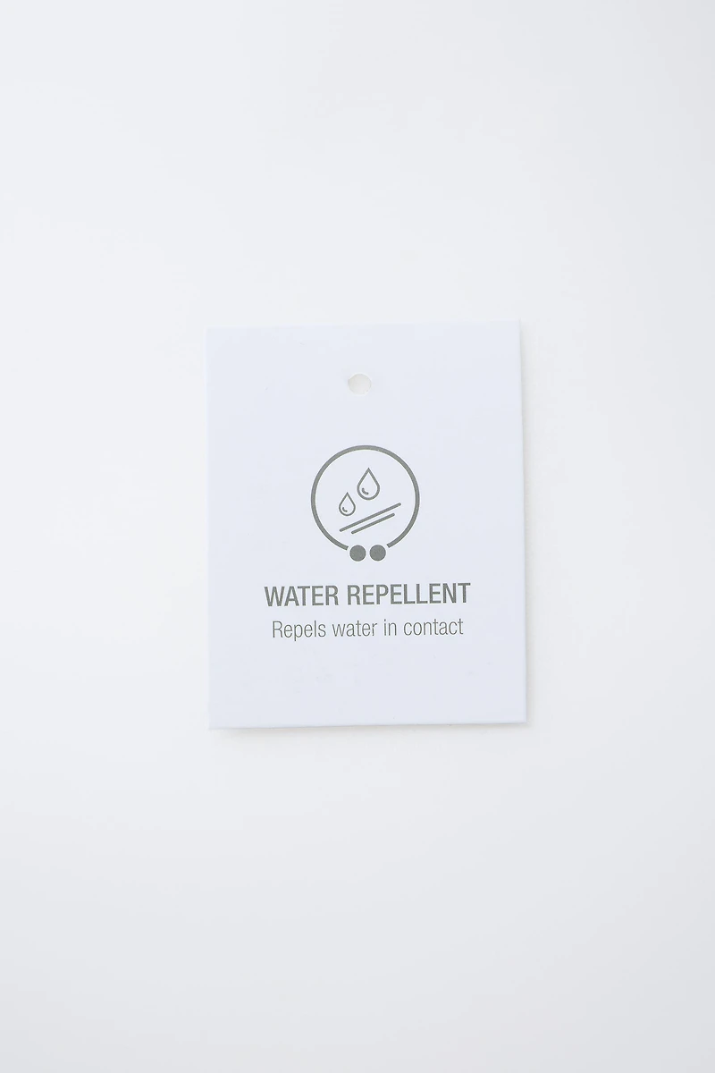 VESTE ULTRALÉGÈRE À CAPUCHE DÉPERLANTE