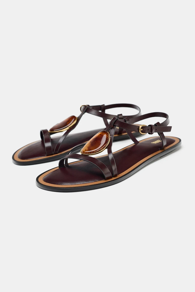 SANDALS WITH METALLIC APPLIQUÉ