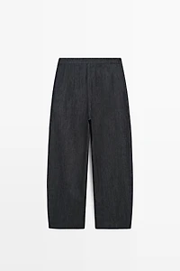 High-waist pants with crossover detail