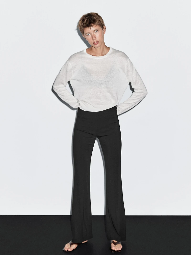 Flared trousers with pocket