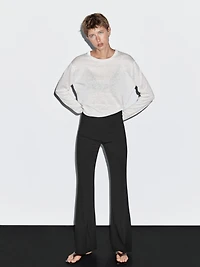 Flared trousers with pocket